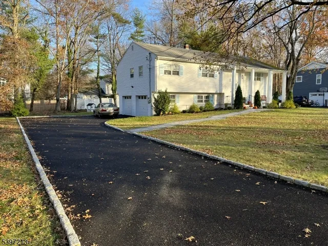 a view of a town with large trees