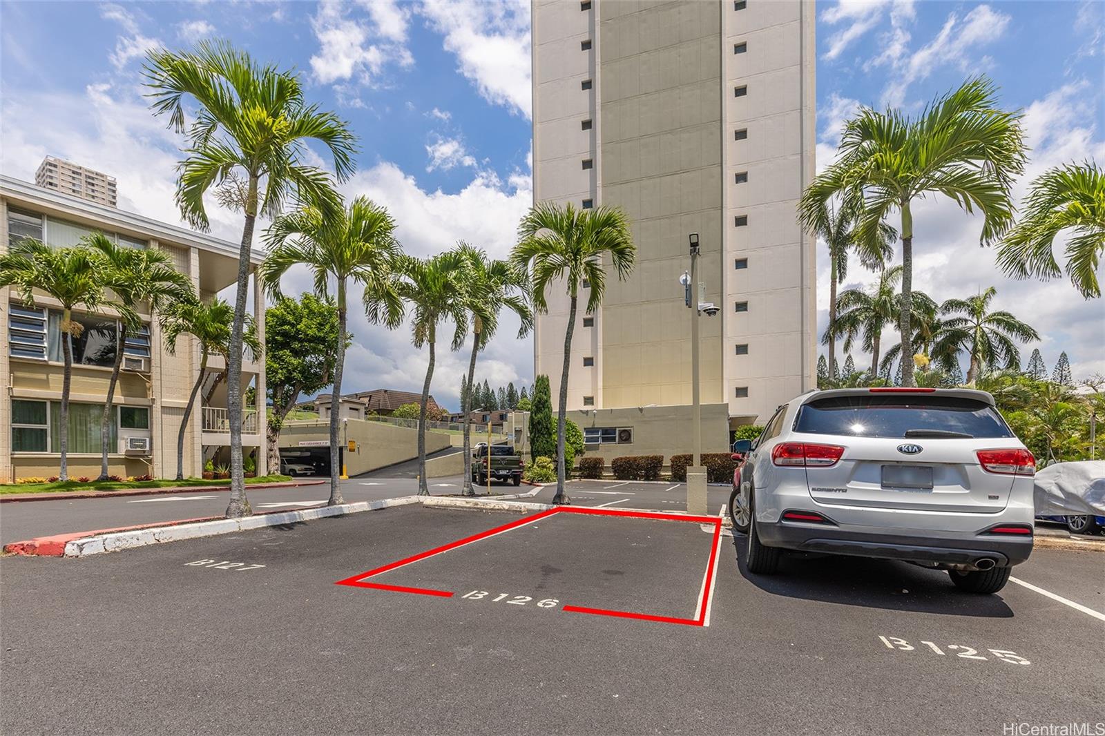 98-1038 Moanalua Road, Unit 7608 Aiea, HI 96701 - Photo 19 of 25 a car parked on the side of a street