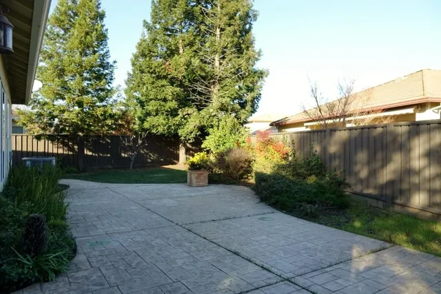 a view of backyard with green space