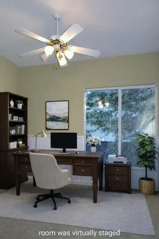 a view of a workspace with furniture