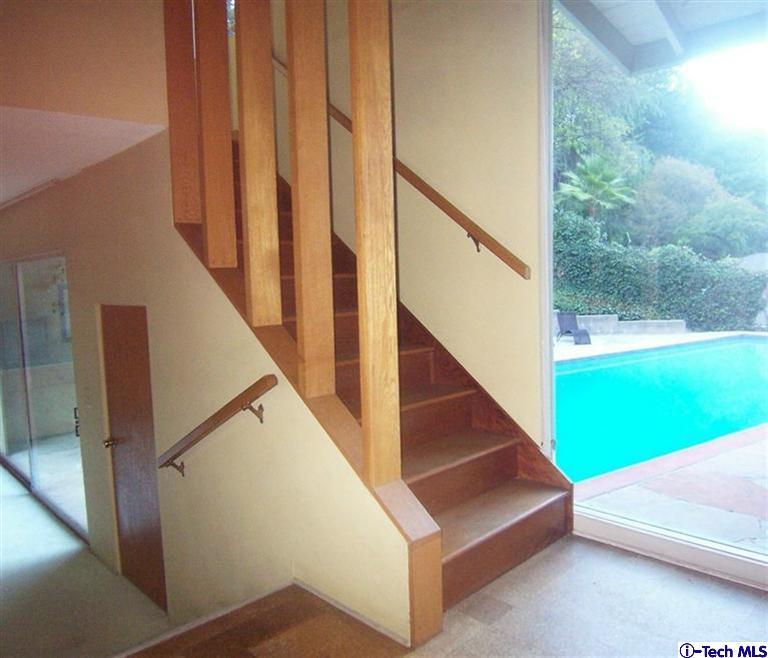 Undisclosed Address Pasadena, CA 91103 - Photo 13 of 33 a view of an entryway with staircase