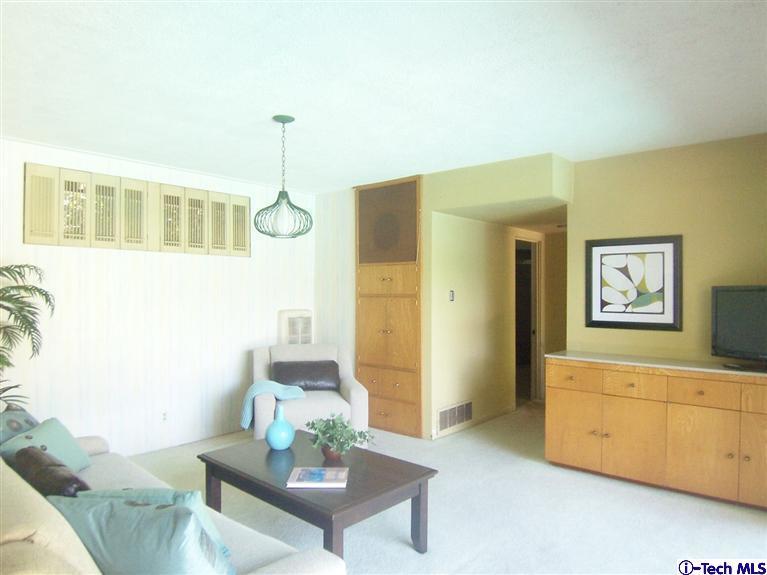 Undisclosed Address Pasadena, CA 91103 - Photo 15 of 33 a living room with furniture and a table