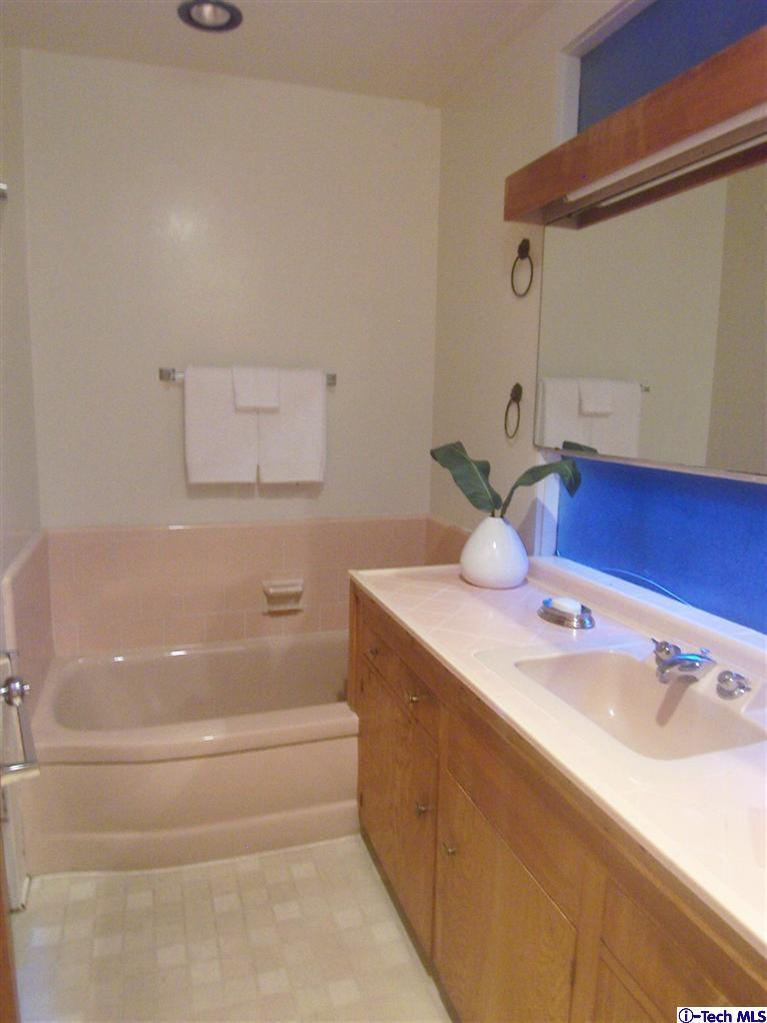 Undisclosed Address Pasadena, CA 91103 - Photo 19 of 33 a bathroom with a sink and a bathtub