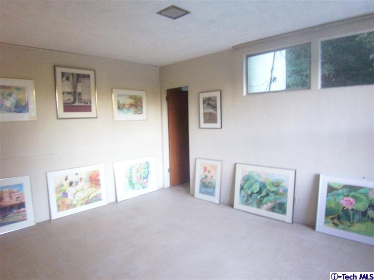 Undisclosed Address Pasadena, CA 91103 - Photo 26 of 33 a view of an empty room with furniture and window