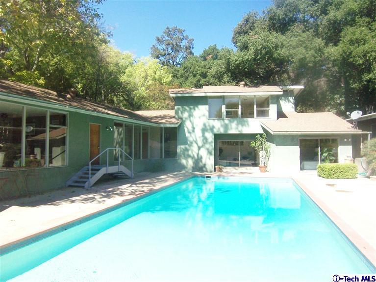 Undisclosed Address Pasadena, CA 91103 - Photo 32 of 33 a front view of a house with a yard