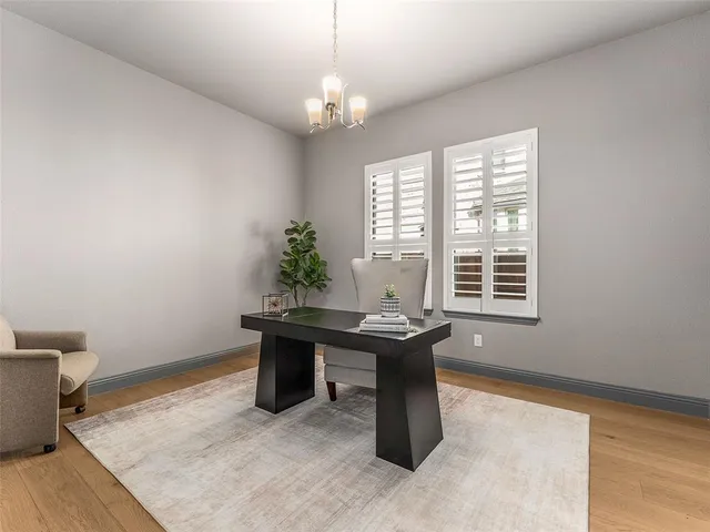 a view of a workspace with furniture