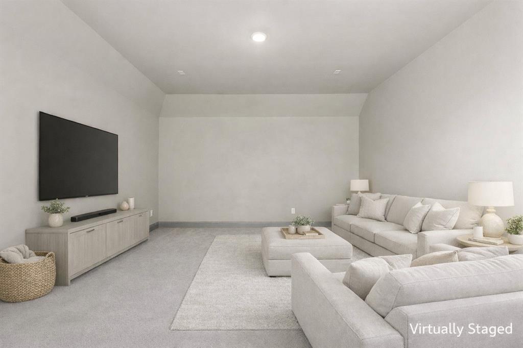 1930 Inwood Lane Prosper, TX 75078 - Photo 24 of 37 a living room with furniture and a flat screen tv