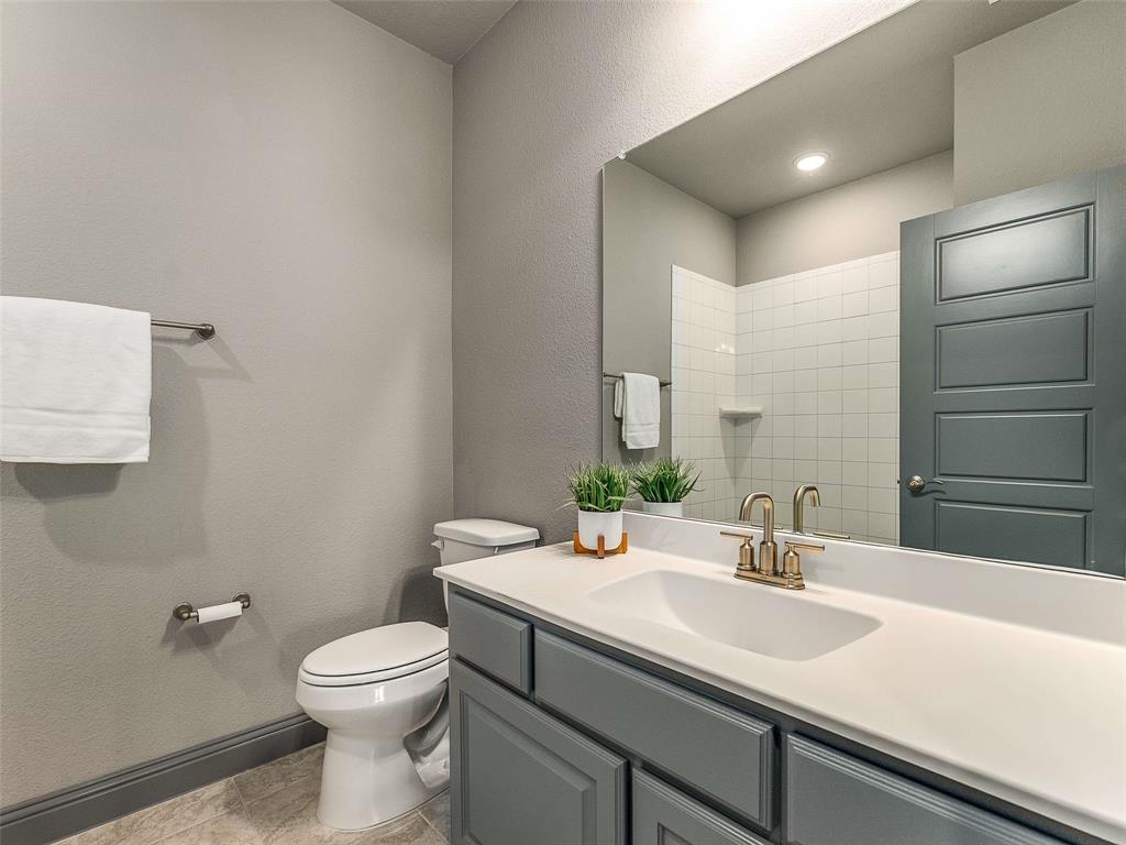 1930 Inwood Lane Prosper, TX 75078 - Photo 26 of 37 a bathroom with a sink toilet and mirror