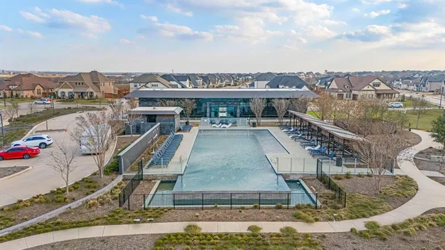 a room with gym equipment and a large window