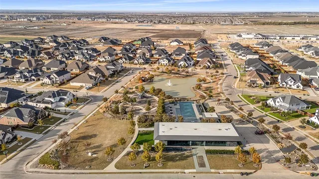 an aerial view of residential building with ocean view