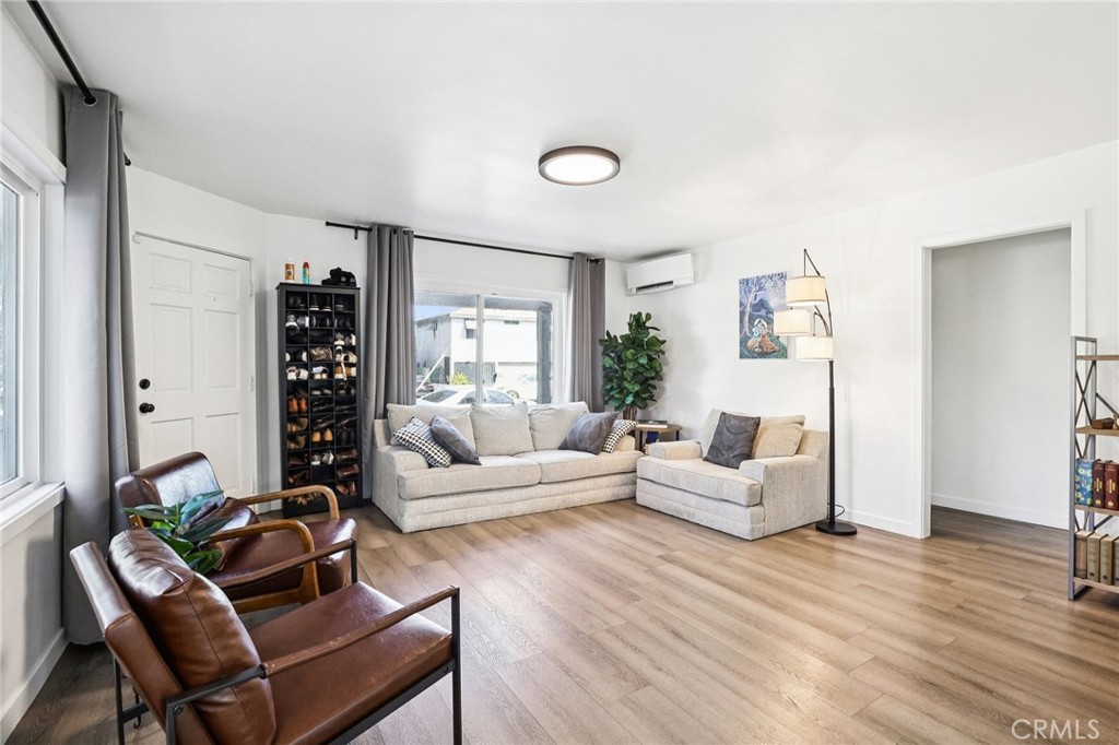1448 Lemon Avenue Long Beach, CA 90813 - Photo 3 of 16 a living room with furniture and a wooden floor