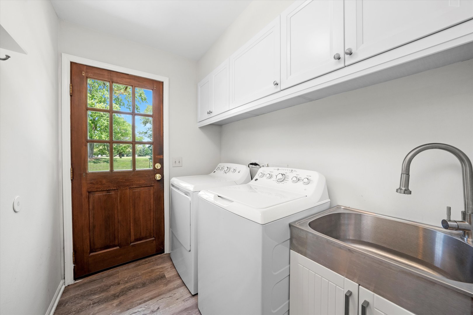 211 Danada Drive Wheaton, IL 60189 - Photo 19 of 51 a utility room with sink dryer and washer