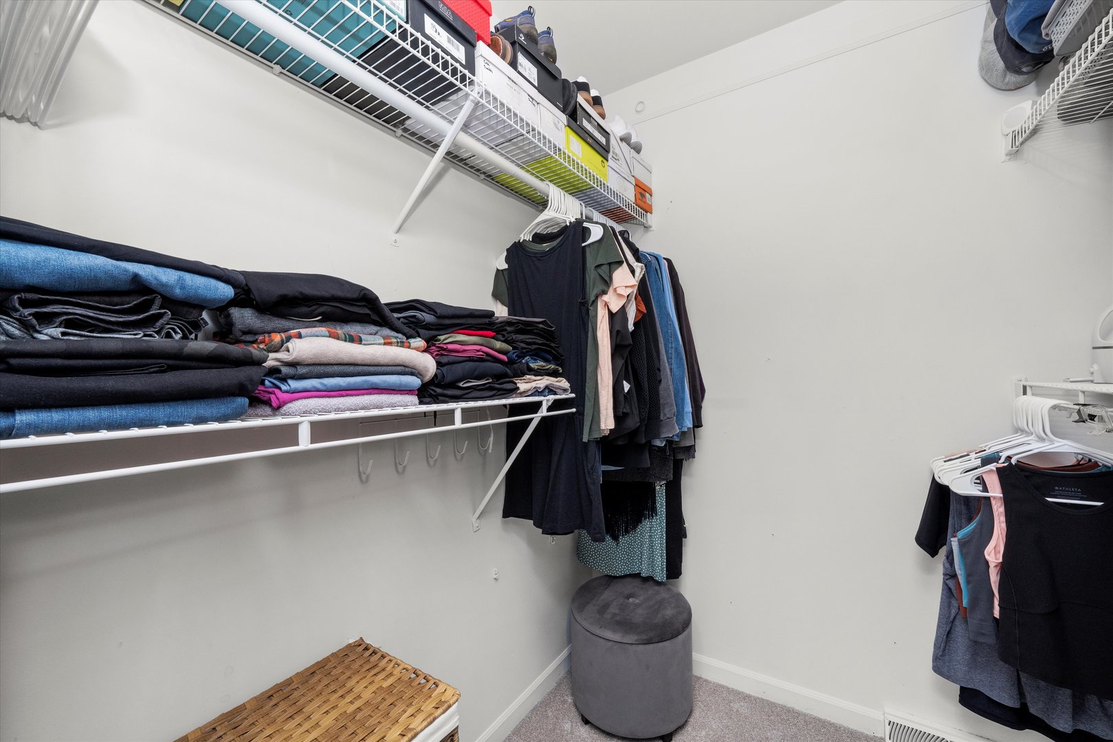 211 Danada Drive Wheaton, IL 60189 - Photo 25 of 51 a view of walk in closet with clothes and shoes