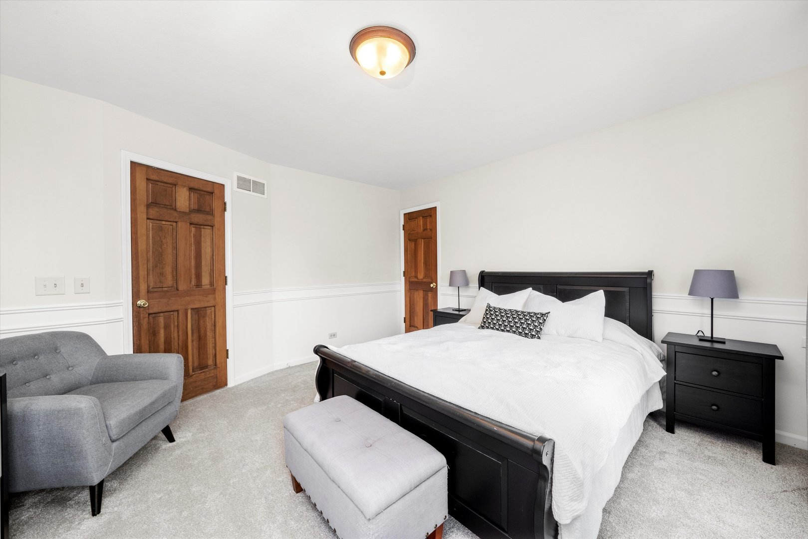 211 Danada Drive Wheaton, IL 60189 - Photo 30 of 51 a bedroom with a bed and a couch