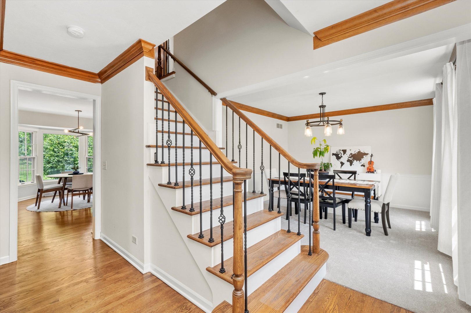 211 Danada Drive Wheaton, IL 60189 - Photo 4 of 51 a view of a dining room with furniture wooden floor and a chandelier