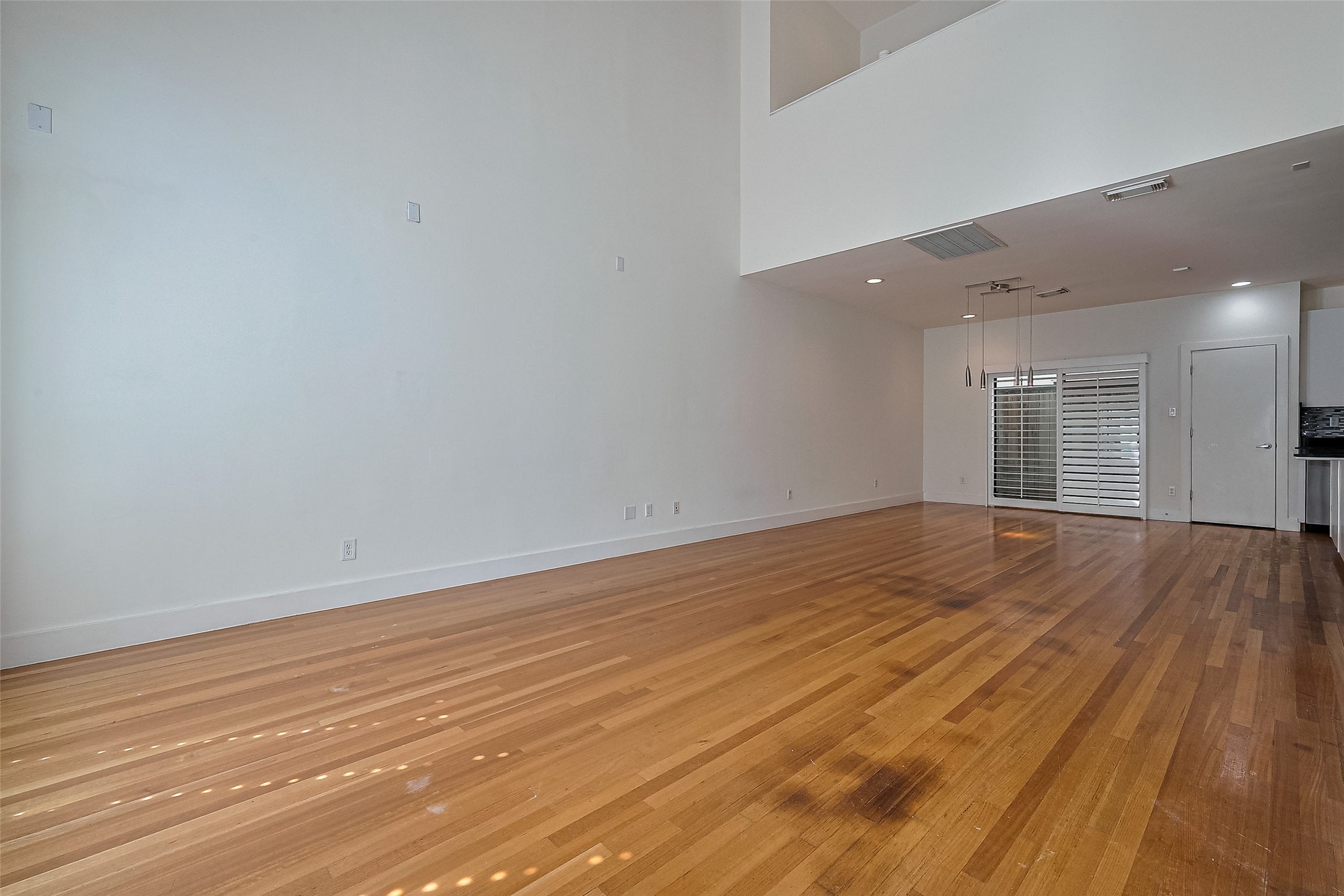 4331 Eigel Street Houston, TX 77007 - Photo 8 of 38 a view of empty room with wooden floor