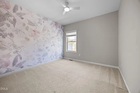 a view of backyard of the house