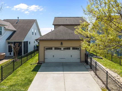 a white bath tub sitting under a bathroom