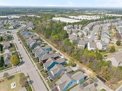 an aerial view of residential building with outdoor space
