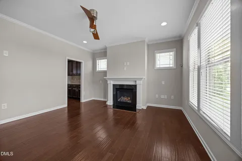 a view of an entryway with wooden floor