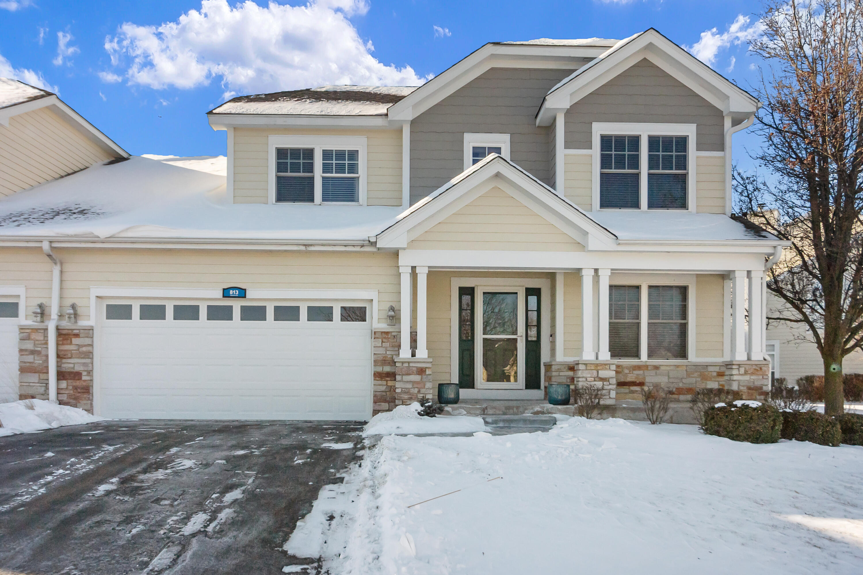 Covered entrance, 2 car attached garage.
