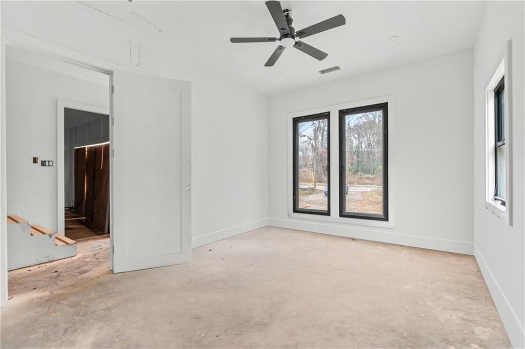 2659 Flat Shoals Road Decatur, GA 30034 - Photo 8 of 19 a view of an empty room with a window