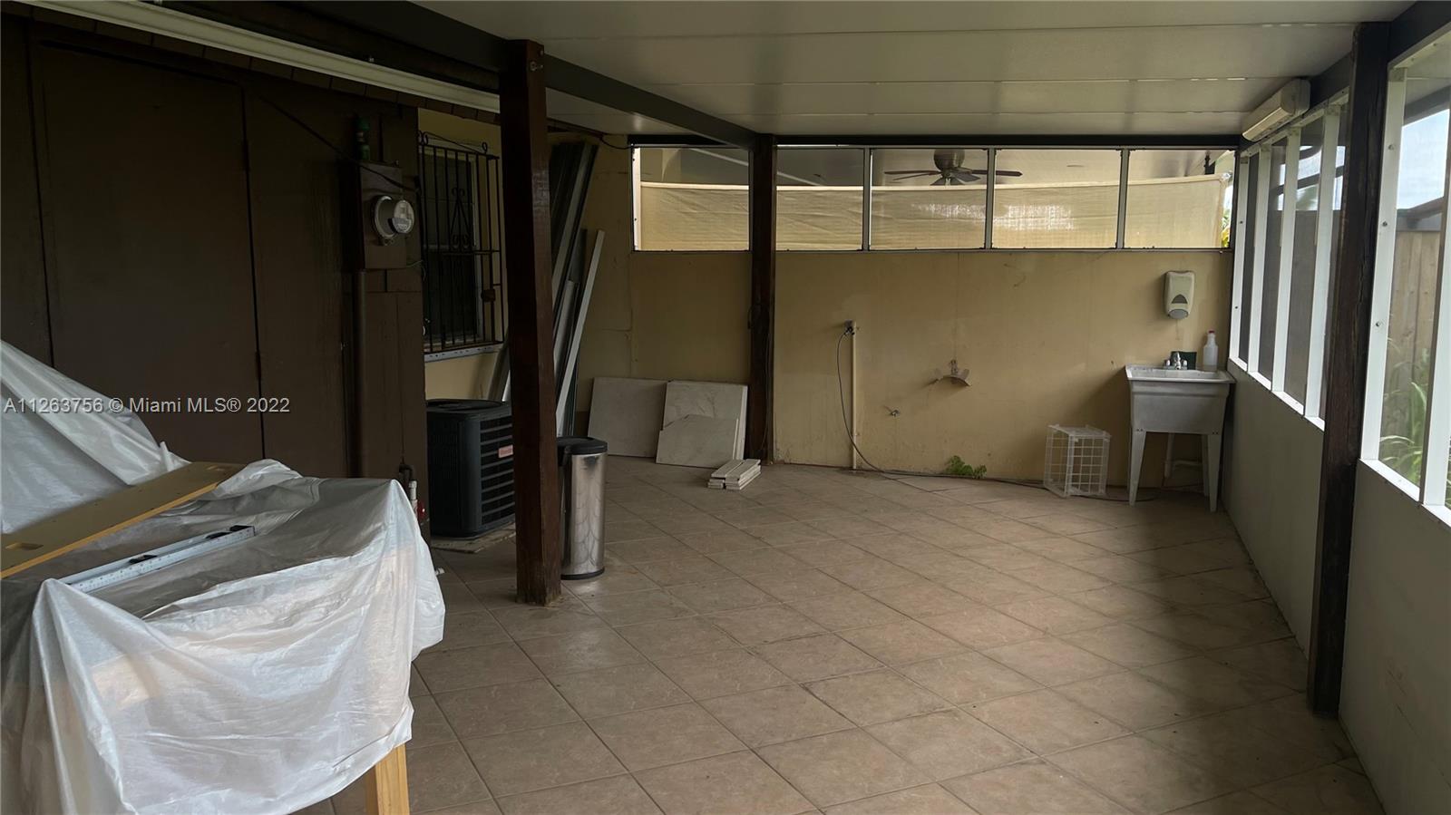 12104 Southwest 110th St Circle South Miami, FL 33186 - Photo 8 of 8 a view of utility room