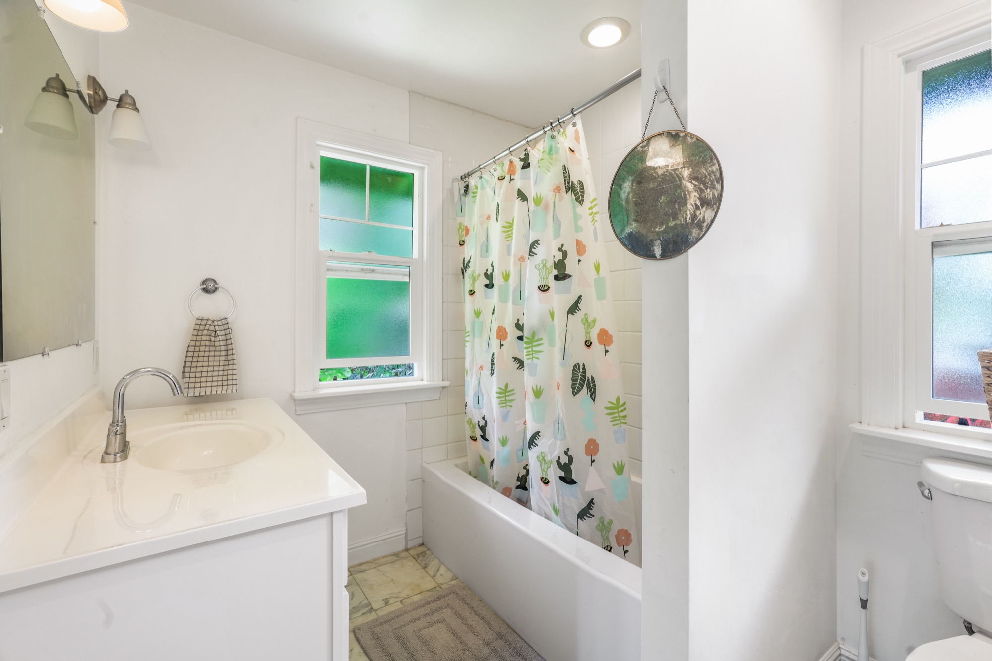 5974 Lokelani Road Kapaa, HI 96746 - Photo 11 of 24 a bathroom with a sink a toilet and a bathtub