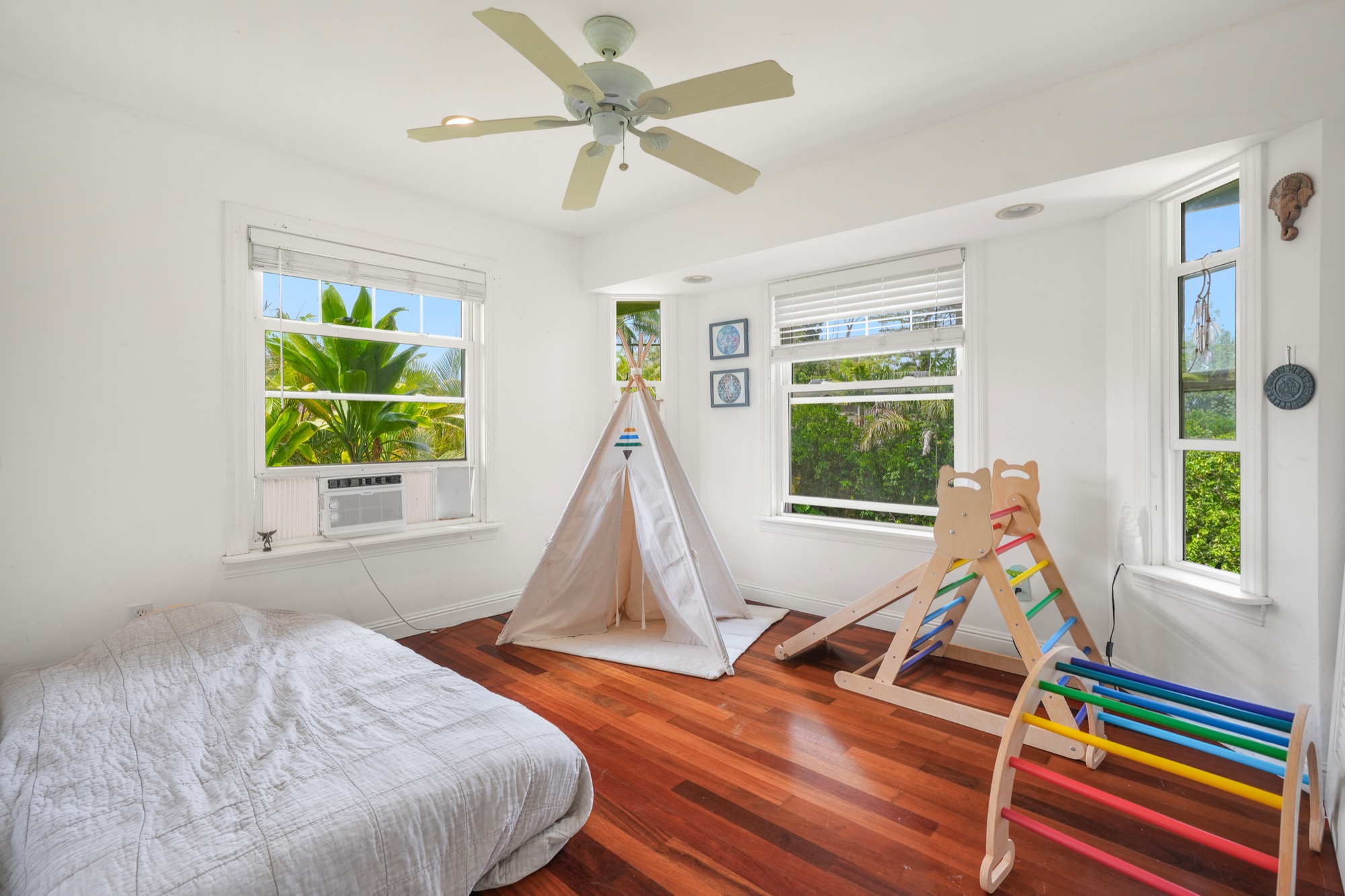 5974 Lokelani Road Kapaa, HI 96746 - Photo 14 of 24 a bedroom with a bed and a window
