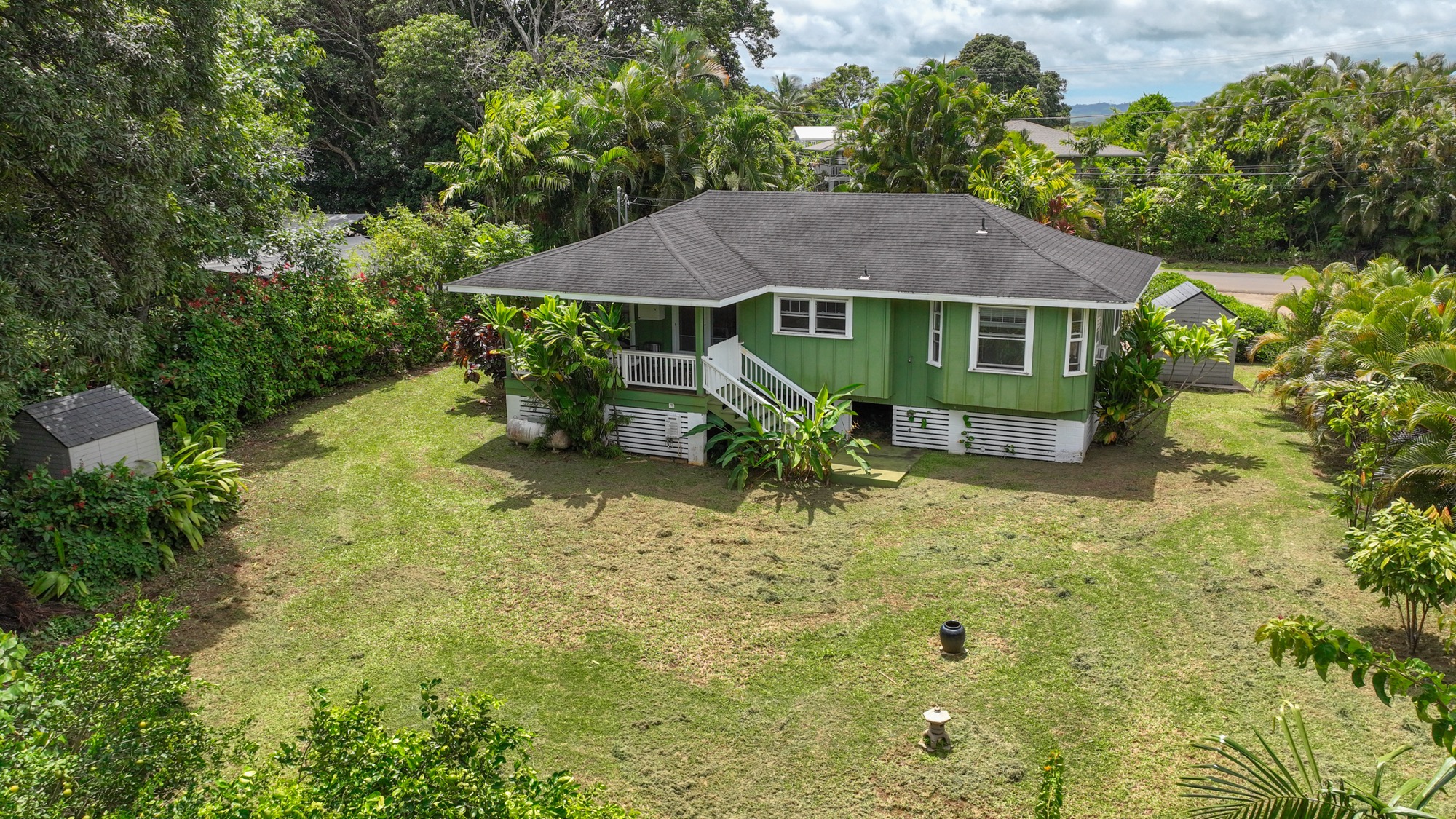 5974 Lokelani Road Kapaa, HI 96746 - Photo 16 of 24 a front view of a house with garden