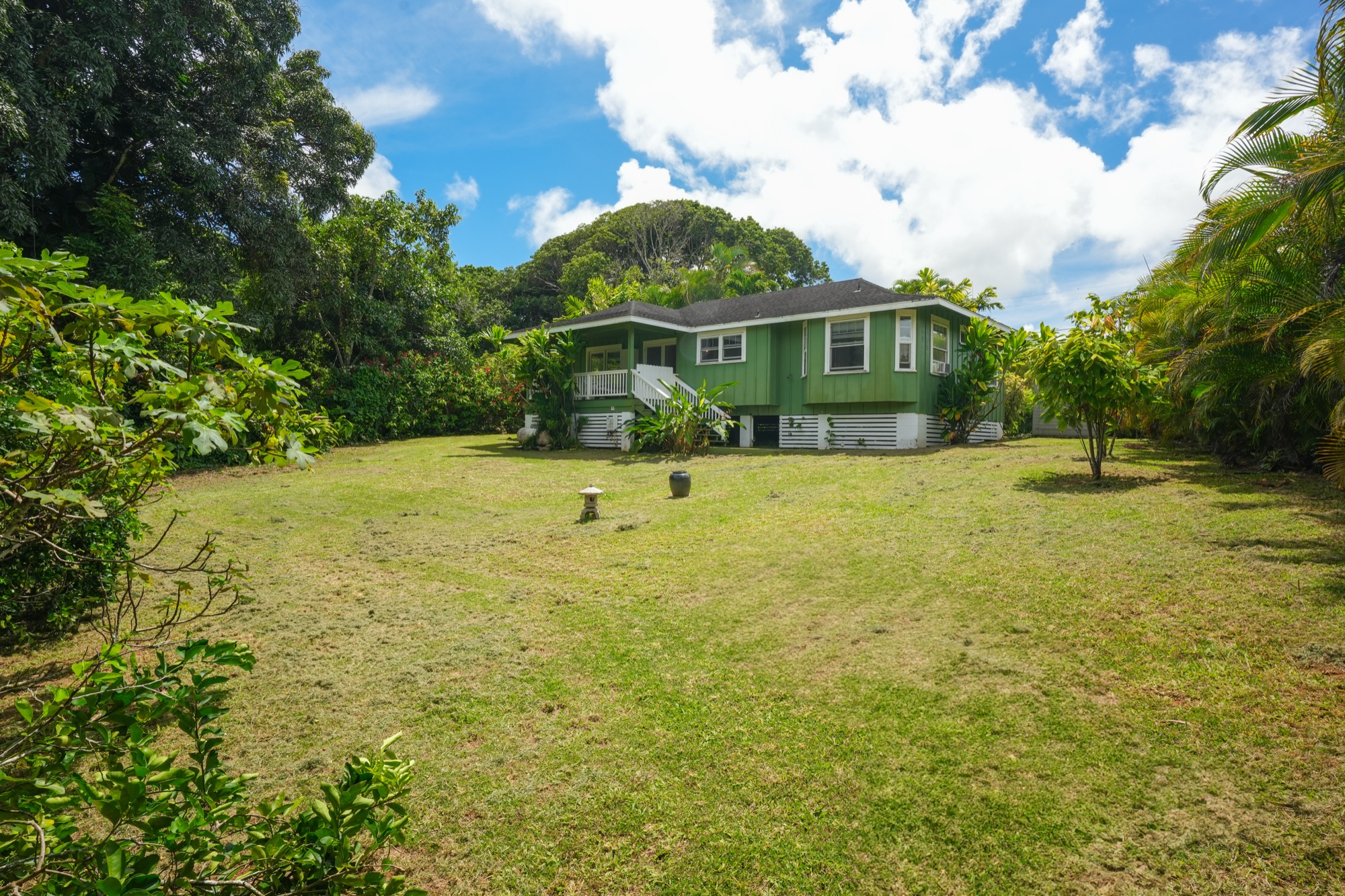 5974 Lokelani Road Kapaa, HI 96746 - Photo 20 of 24 a view of a house with a yard