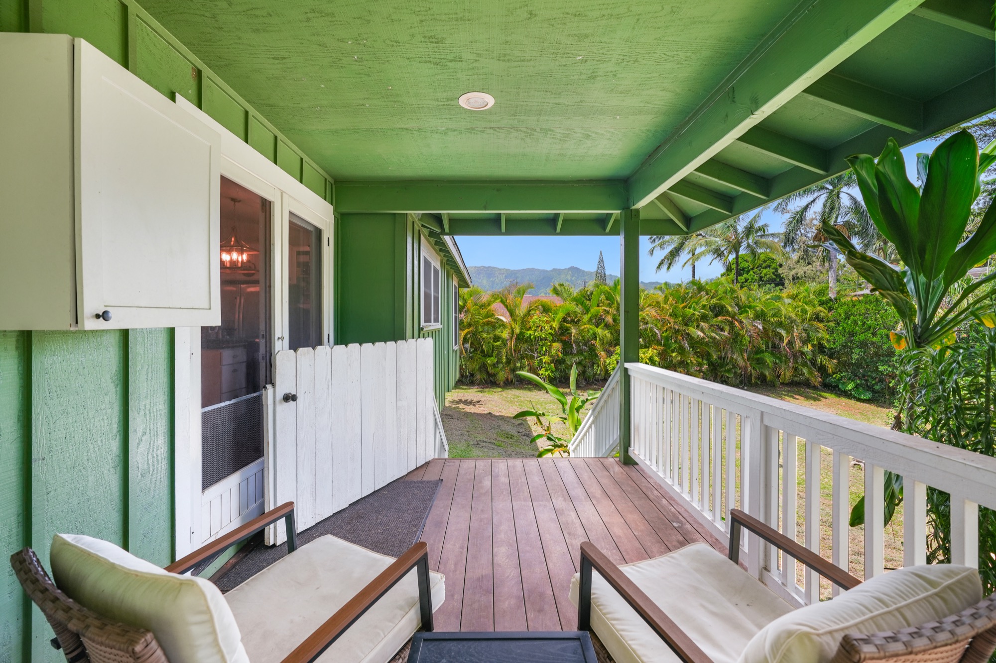 5974 Lokelani Road Kapaa, HI 96746 - Photo 22 of 24 a view of balcony with two chairs and a potted plant