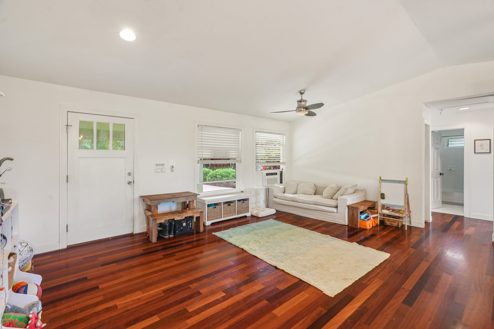 5974 Lokelani Road Kapaa, HI 96746 - Photo 6 of 24 a living room with furniture and a wooden floor