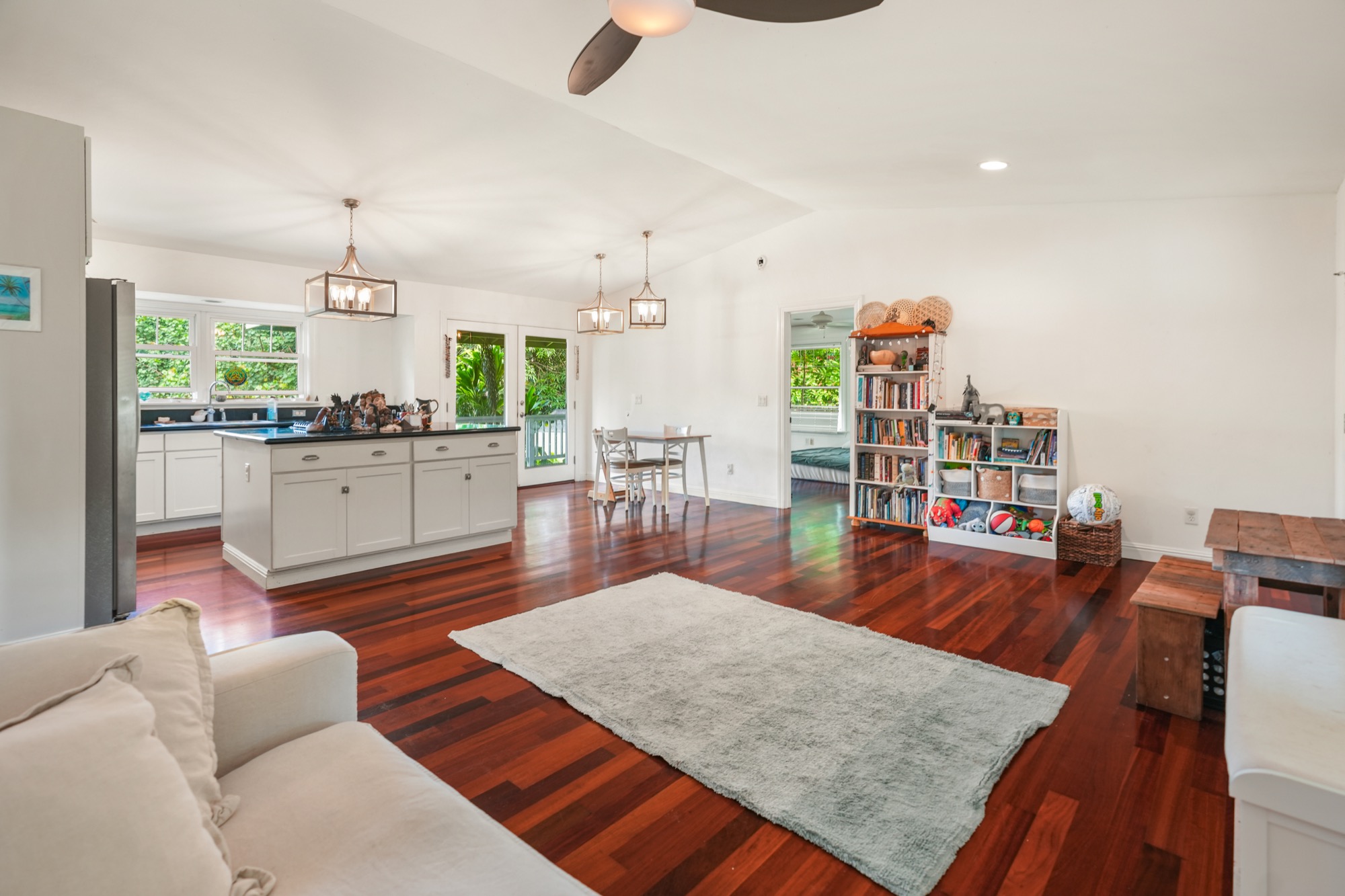5974 Lokelani Road Kapaa, HI 96746 - Photo 7 of 24 a living room with furniture and a wooden floor
