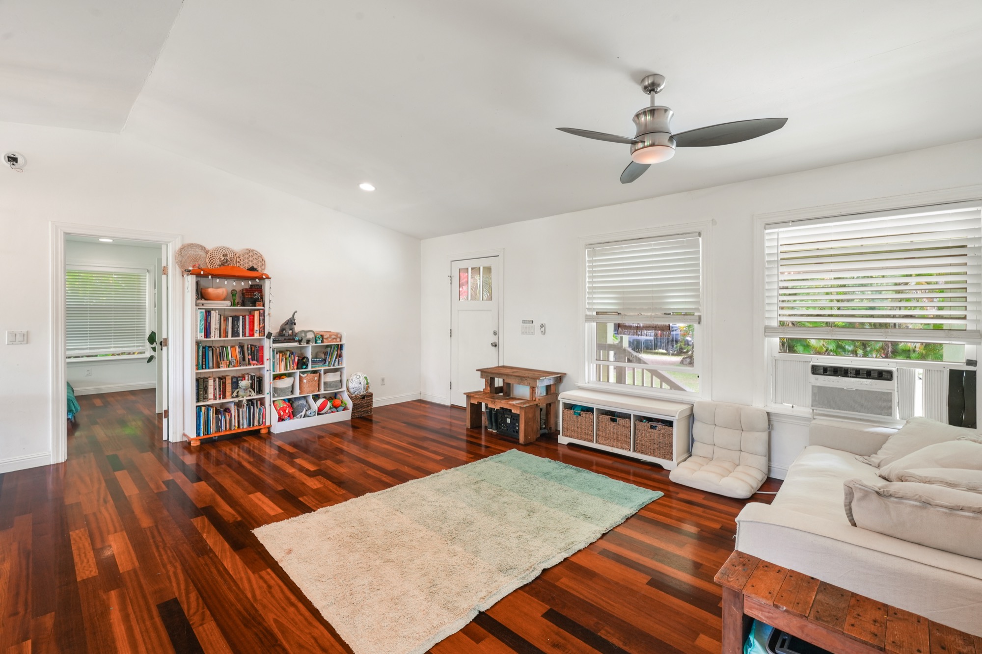 5974 Lokelani Road Kapaa, HI 96746 - Photo 8 of 24 a living room with furniture and a wooden floor