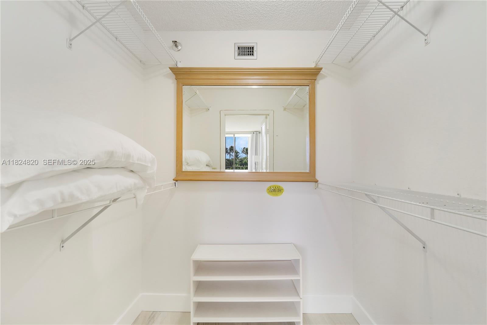 1300 South S Highway, Unit 311 Jupiter, FL 33477 - Photo 25 of 70 Primary bedroom closet