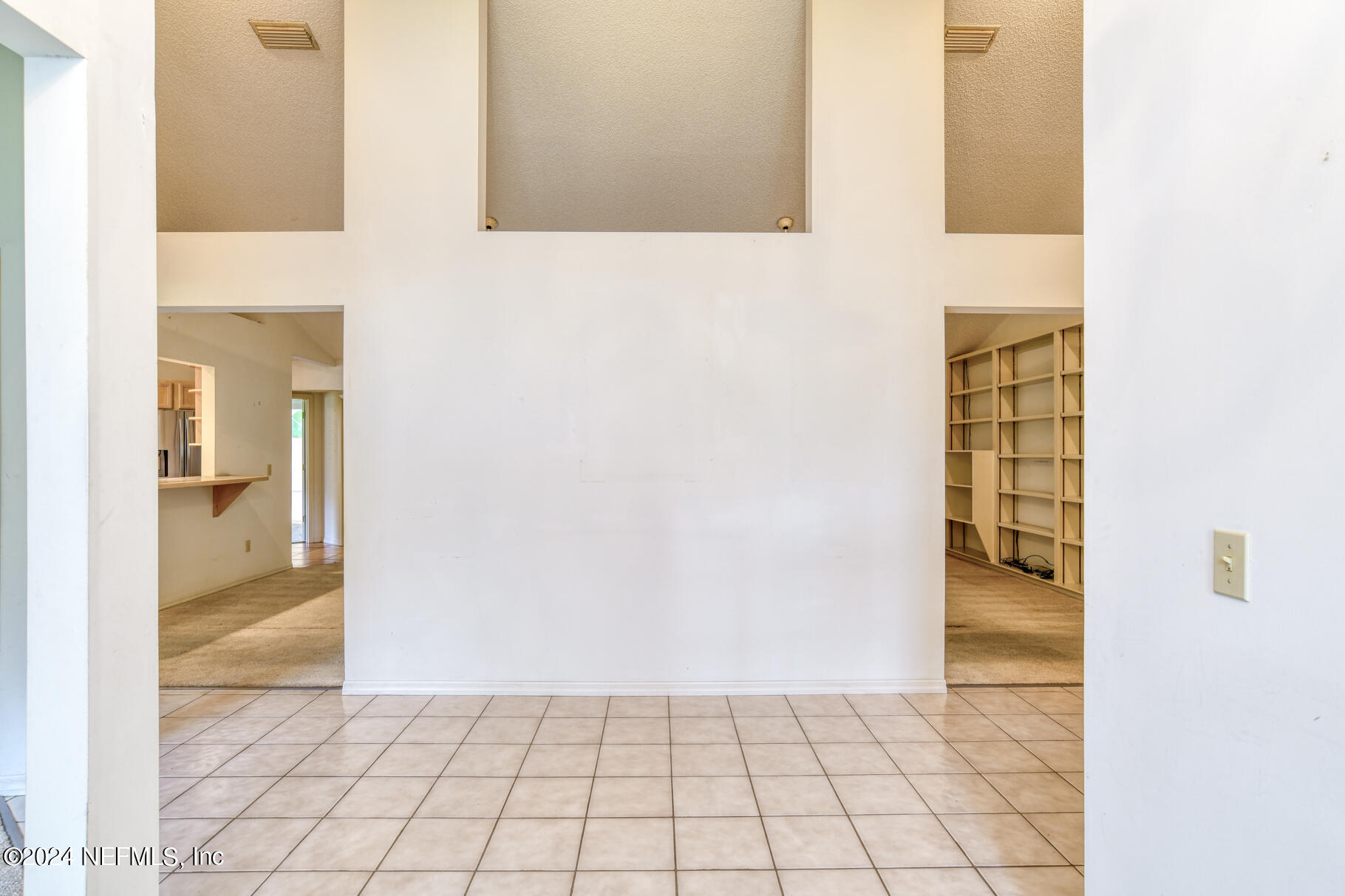 697 Standish Drive St. Augustine, FL 32086 - Photo 14 of 45 a view of an empty room and bathroom