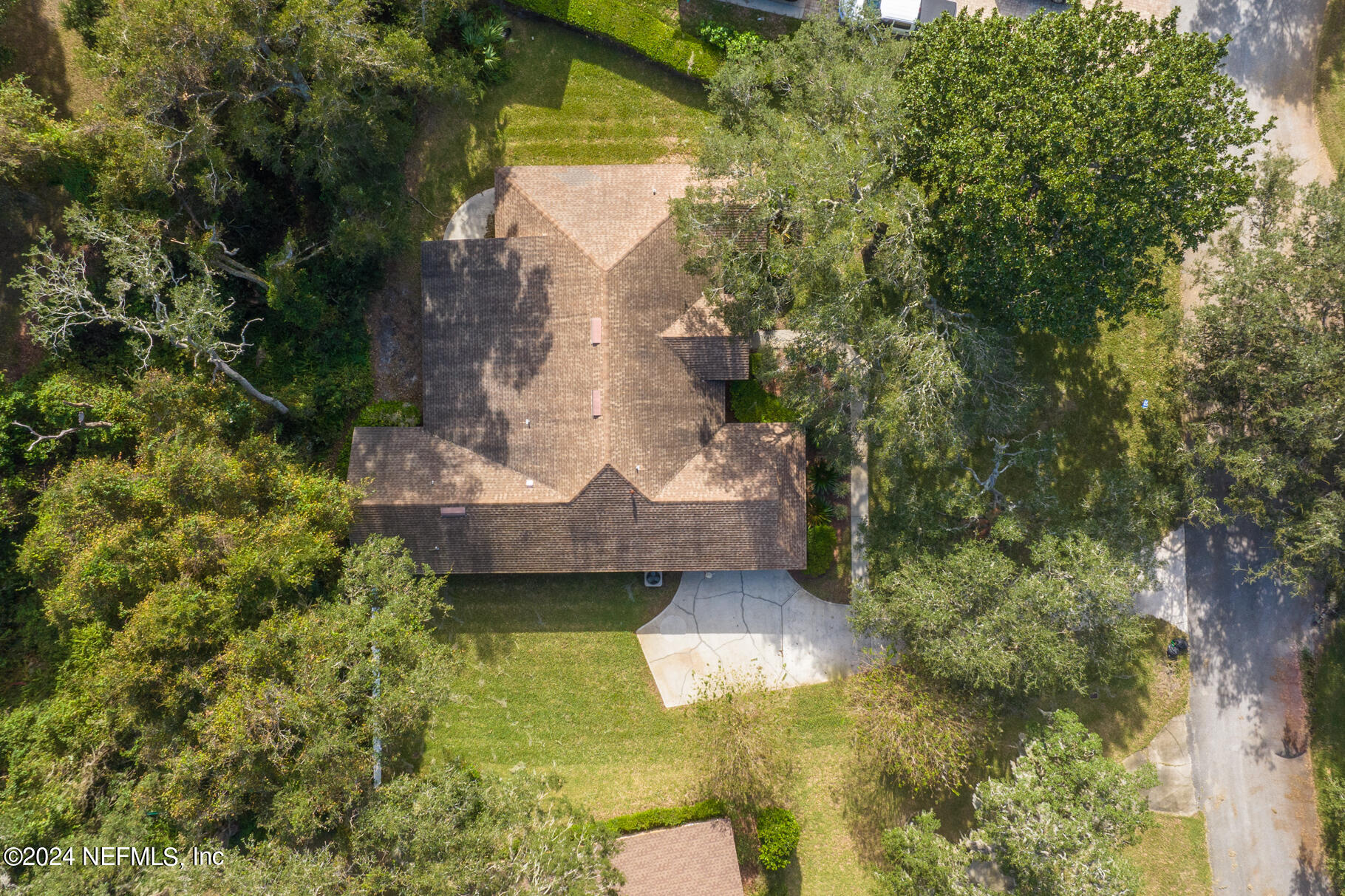697 Standish Drive St. Augustine, FL 32086 - Photo 45 of 45 a view of a house with a yard