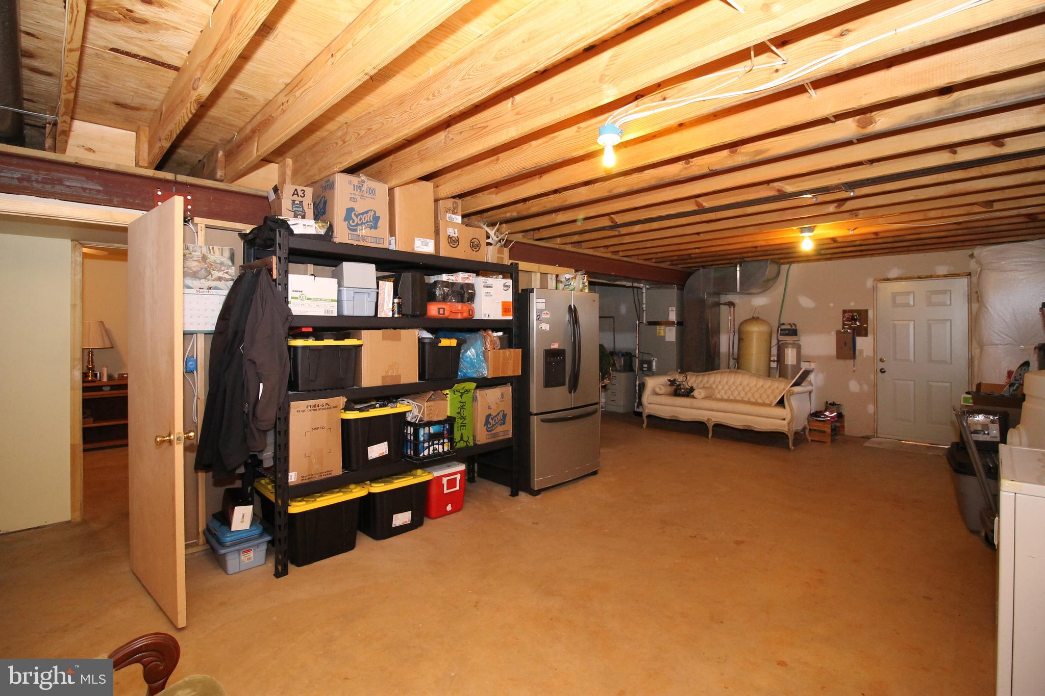18252 South Merrimac Road Culpeper, VA 22701 - Photo 36 of 36 Lower level storage are open to garage