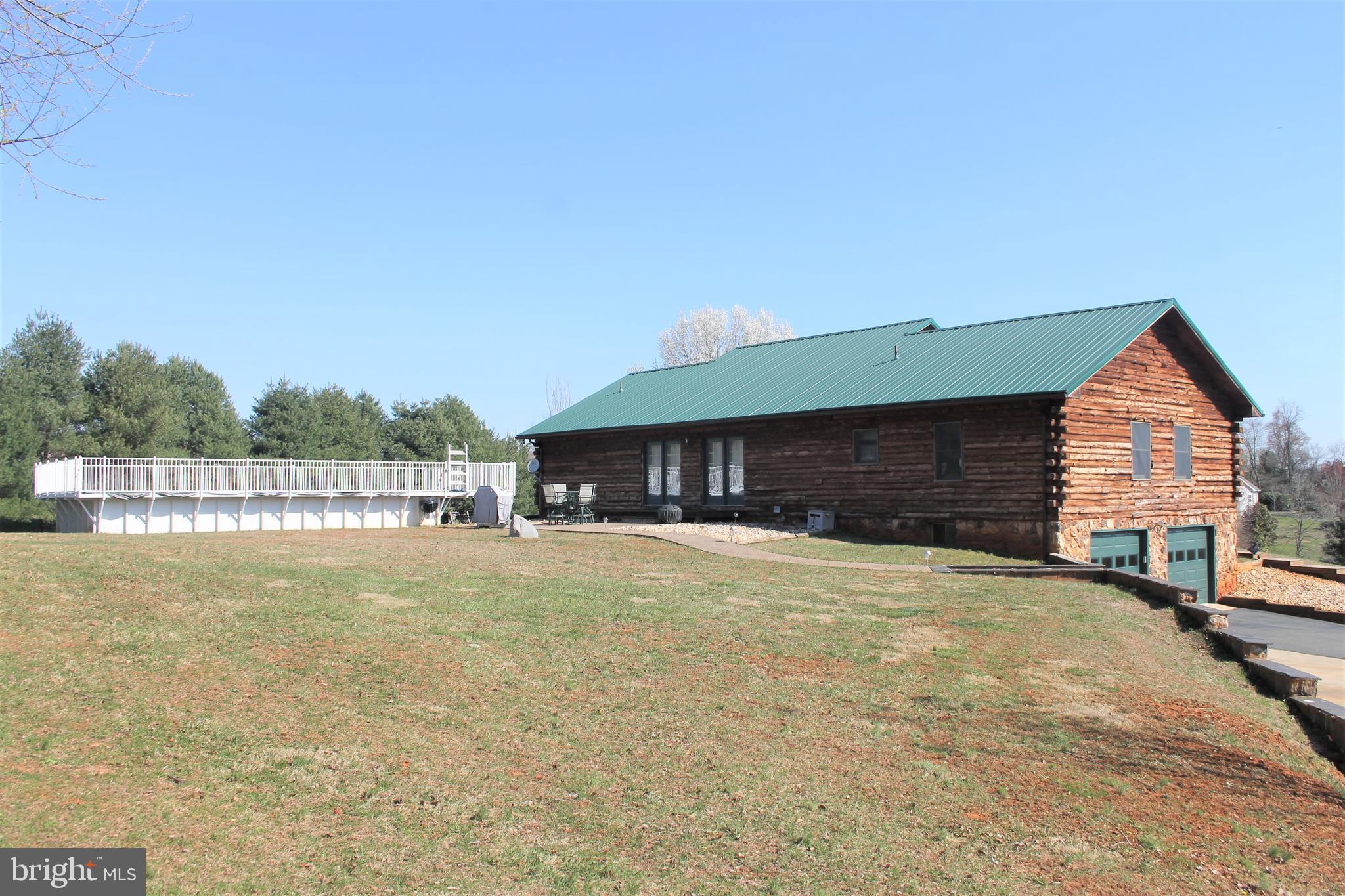 18252 South Merrimac Road Culpeper, VA 22701 - Photo 7 of 36 Rear yard with deck and pool