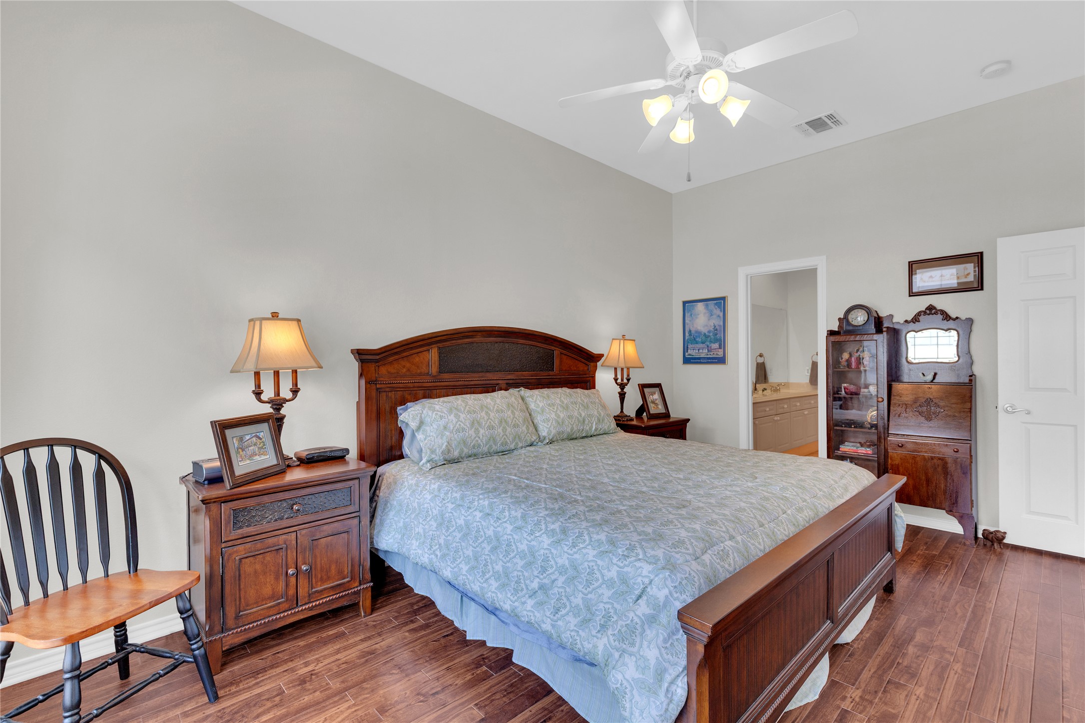 2918 Ranch Road 620 North, Unit L173 Austin, TX 78734 - Photo 14 of 35 Bedroom with dark wood finished floors and ceiling fan