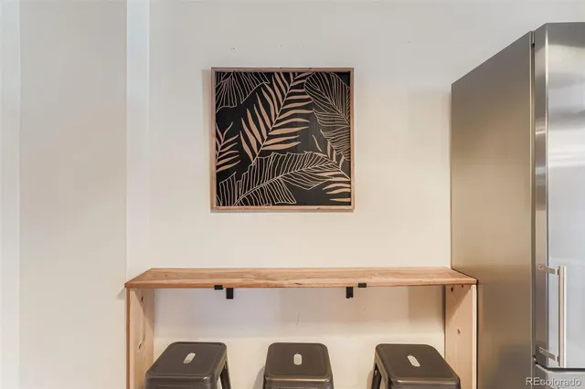 a close up of a utility room with washer and dryer