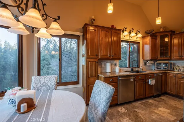 a spacious bathroom with a tub sink and mirror