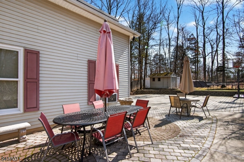 15 Hidden Valley Road Newton, NJ 07860 - Photo 44 of 45 a backyard of a house with table and chairs