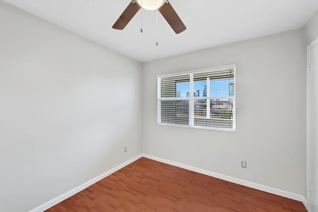 a bathroom with a sink mirror toilet and bathtub