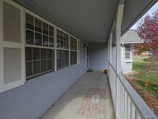 48593 West 9 Mile Road Northville, MI 48167 - Photo 37 of 56 Wrap-around porch!