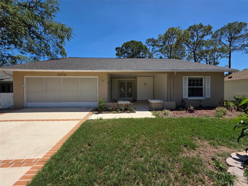 2376 Bent Pine Court Spring Hill, FL 34606 - Photo 1 of 33 a view of backyard of the house