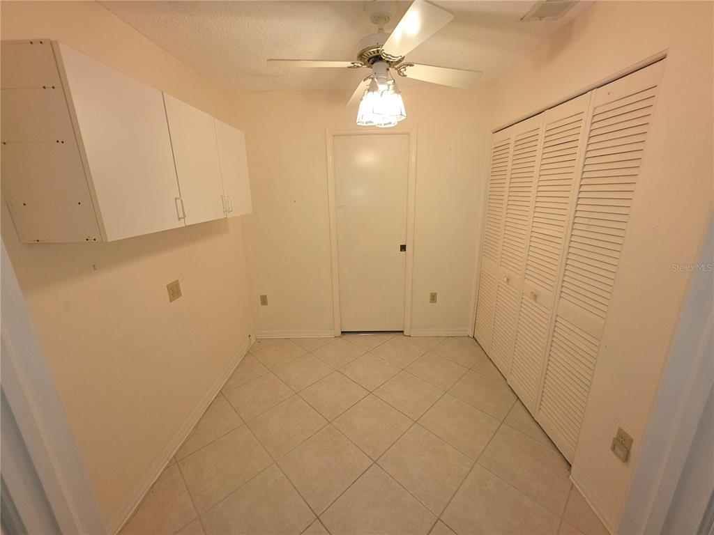 2376 Bent Pine Court Spring Hill, FL 34606 - Photo 9 of 33 a view of an empty room with a window