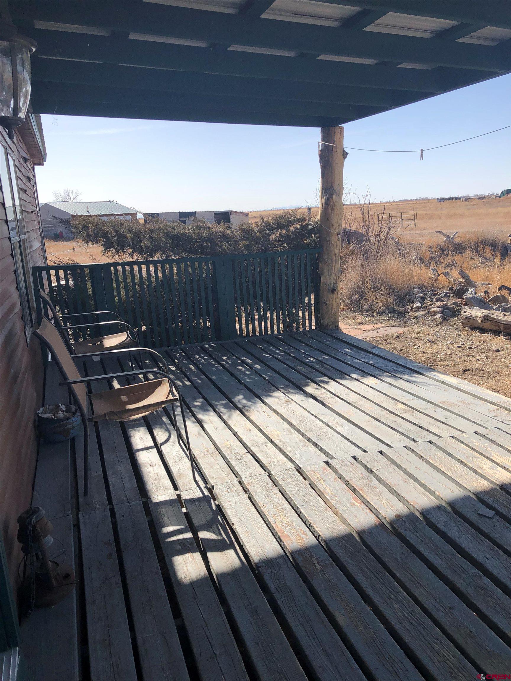 5538 West County Road 10 Del Norte, CO 81132 - Photo 20 of 34 a view of balcony with wooden floor