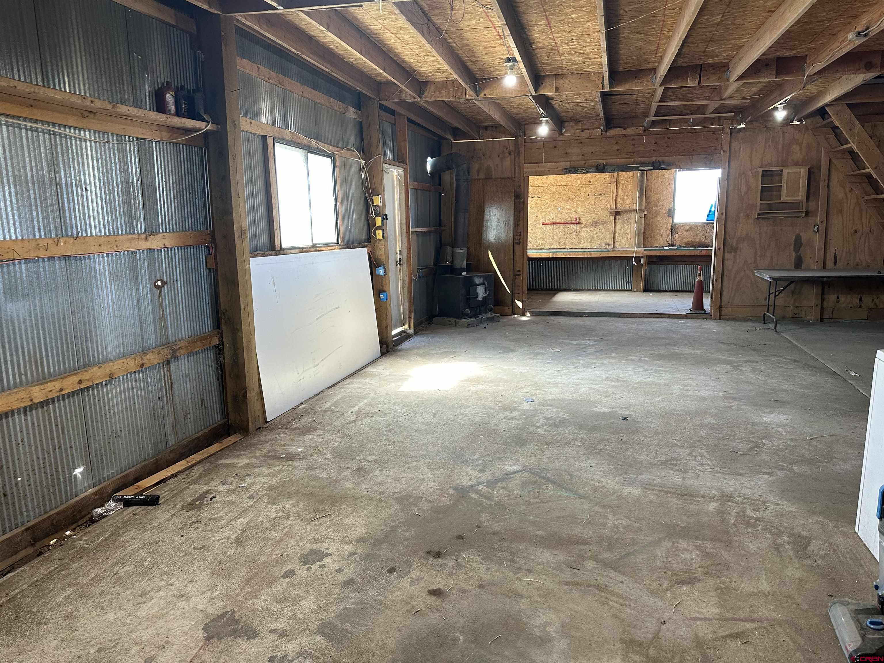 5538 West County Road 10 Del Norte, CO 81132 - Photo 30 of 34 a view of an empty room with a window